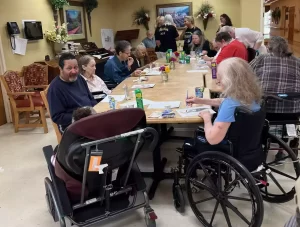 Read more about the article The Maidens of Mischief: Cookies and Crafts at Robertsdale Rehabilitation and Nursing Facility